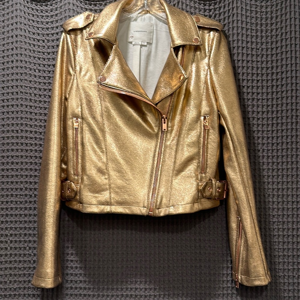 Gold faux leather motorcycle jacket by Anthropologie.